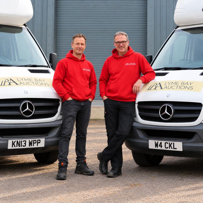 LBA Team Between Branded Mercedes Vans.png
